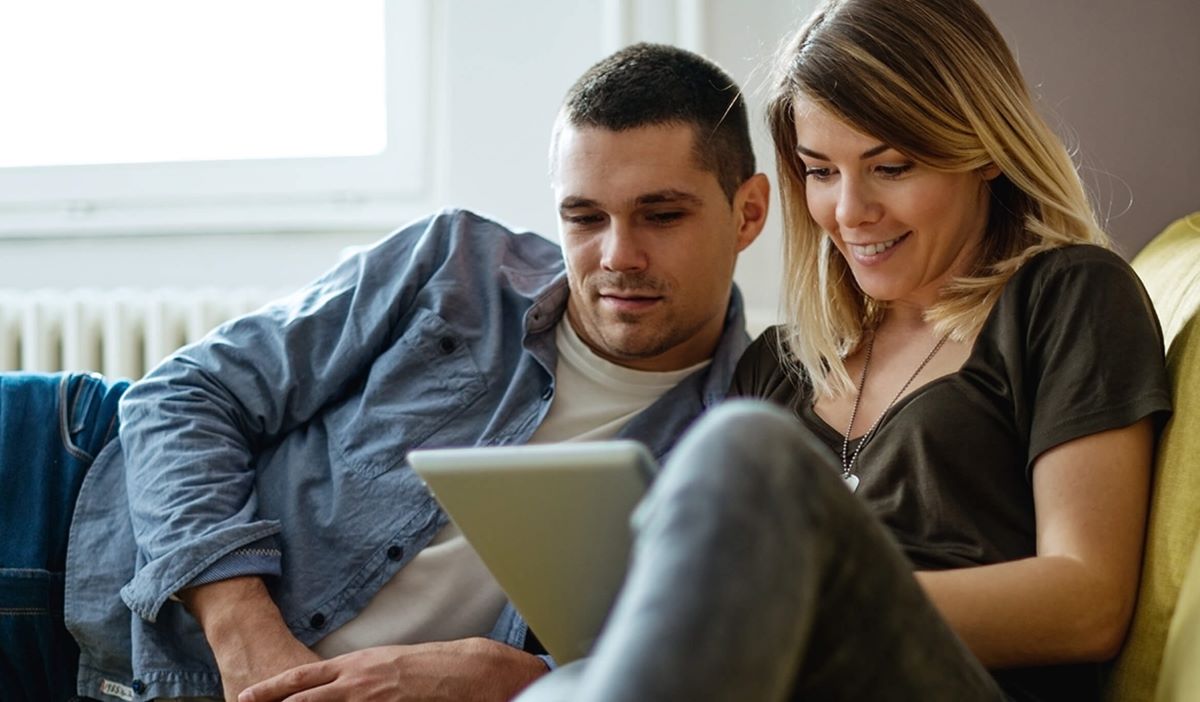 Couple looking at tablet