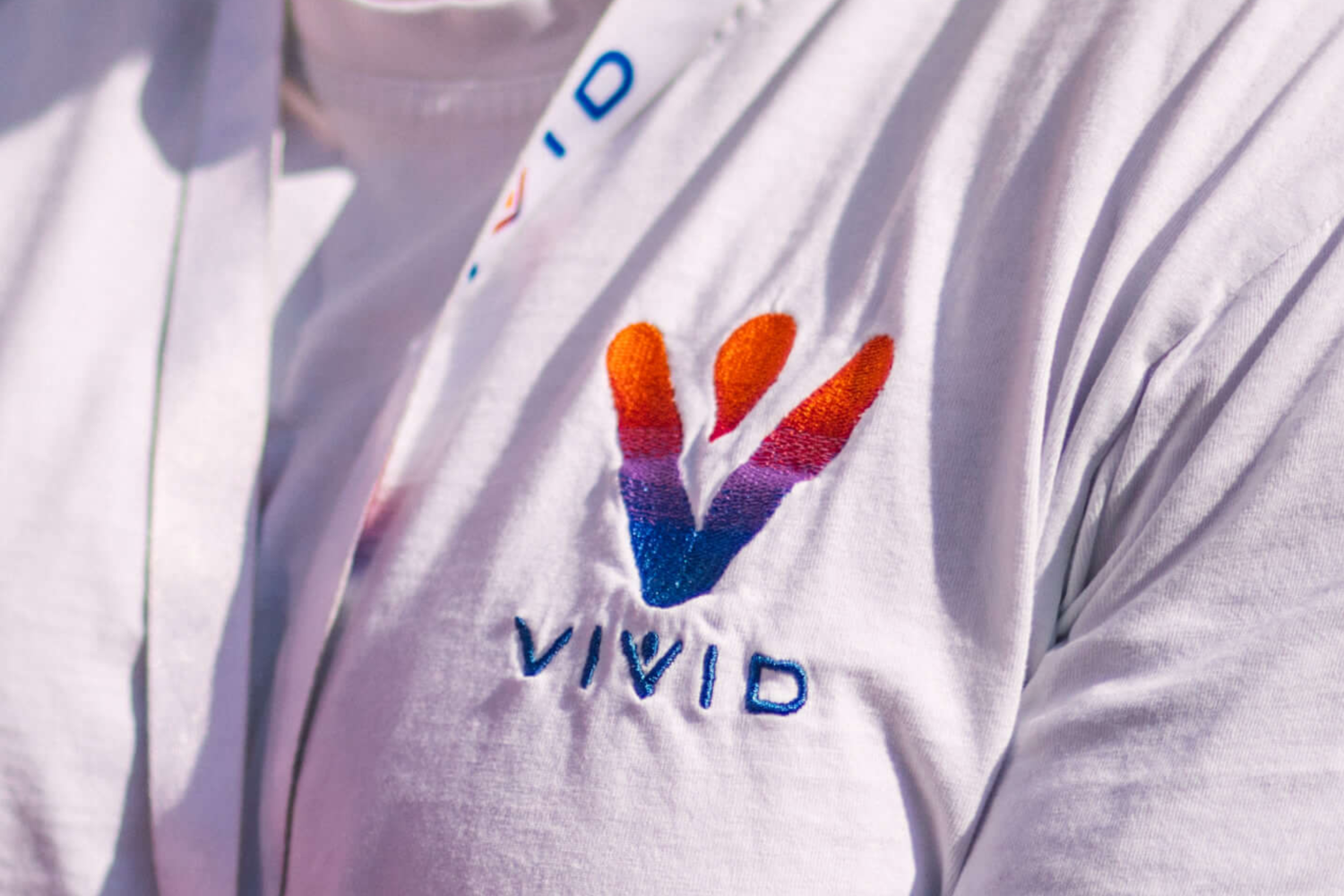 VIVID logo on t-shirt