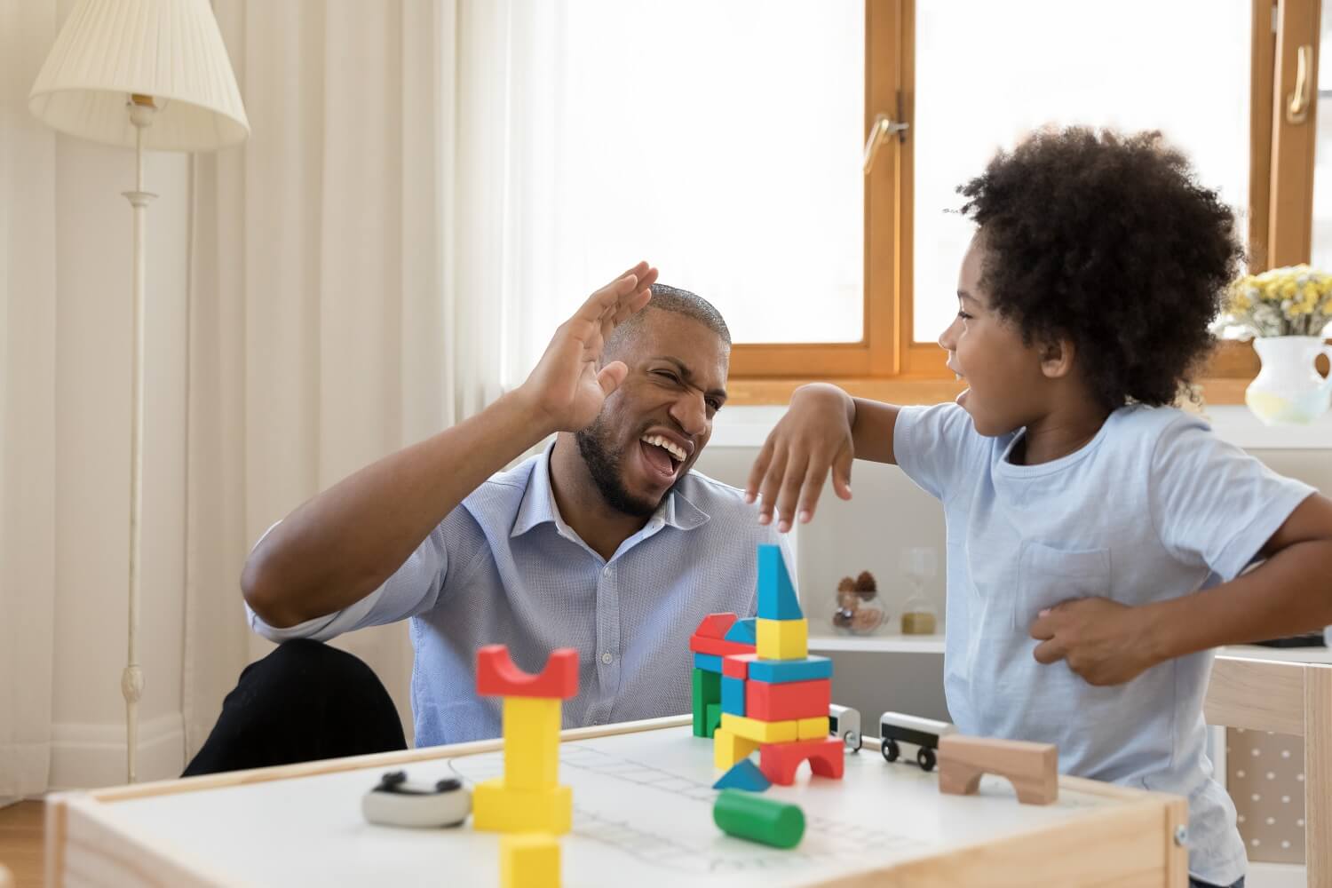 Father and son playing