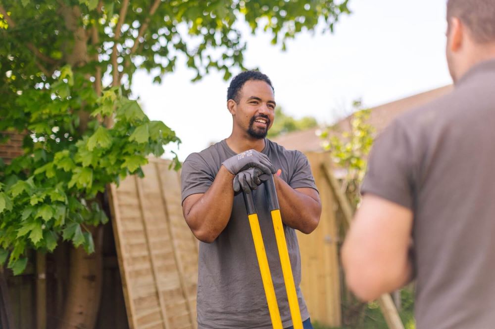 Trade staff on fence repair