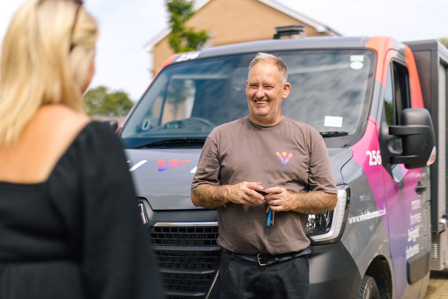 Staff member talking to a customer