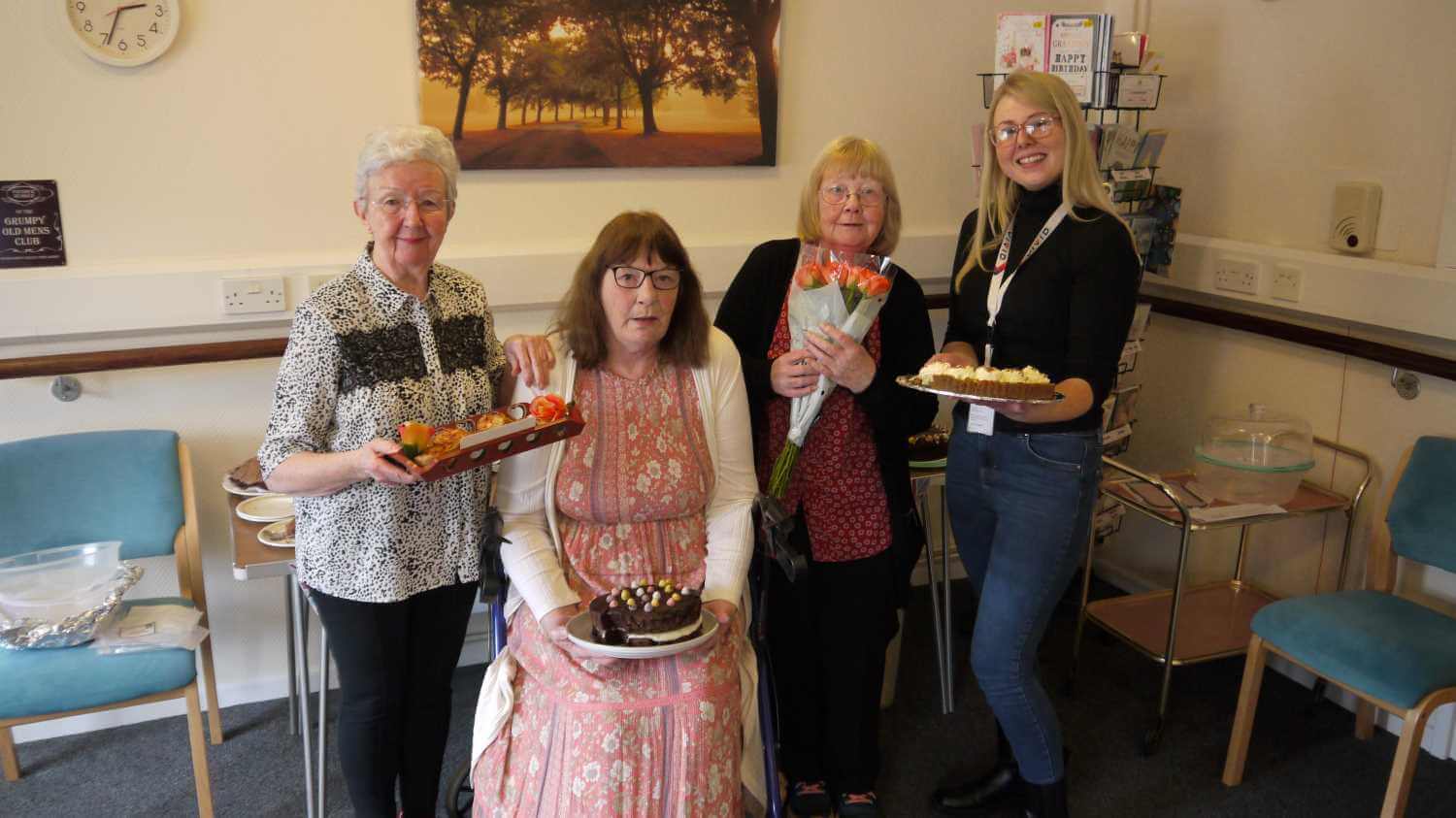 Photo of VIVID customers and staff holding their bakes