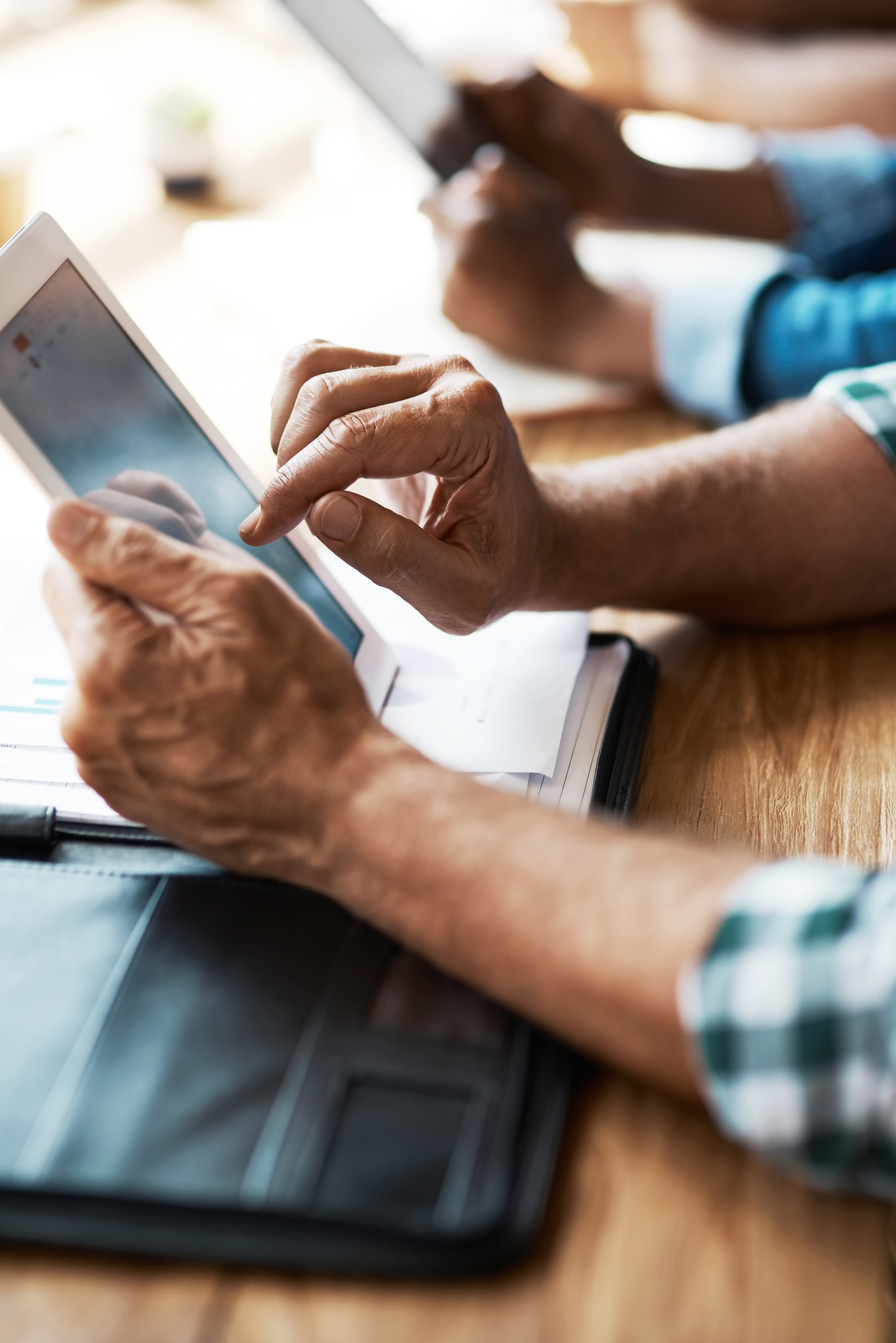 A man using an iPad