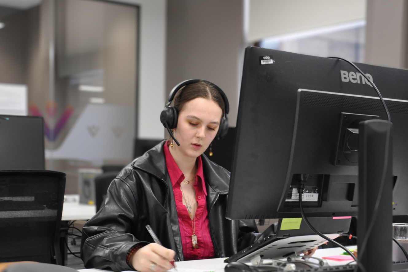 VIVID female staff member on the phone to a customer