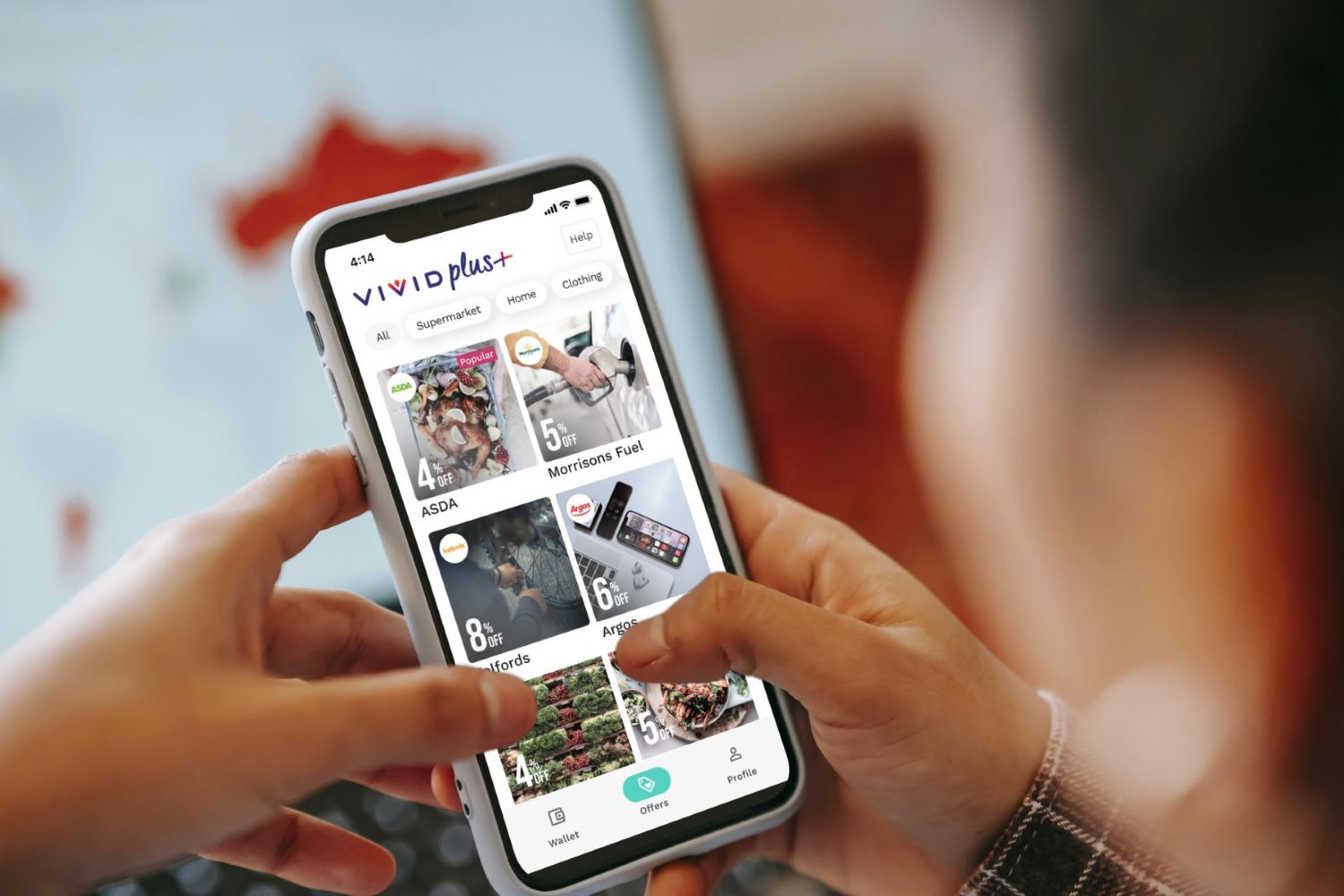 Person on phone using Housing Perks app