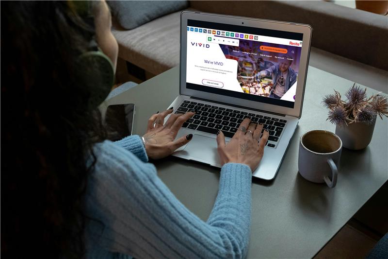 person looking at laptop