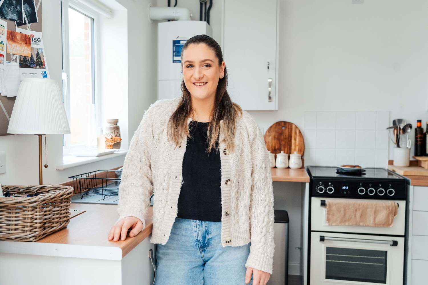Franchesca standing in her kitchen